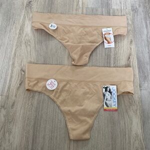 Set of 2 NWT Jockey Natural Beauty Collection thongs, size 8.